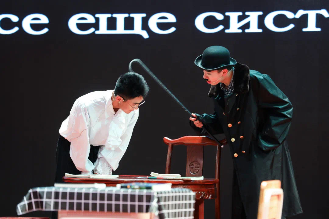 Performing The Man in a Case through Chaplin-style mime